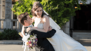 Bride and groom holding smiling